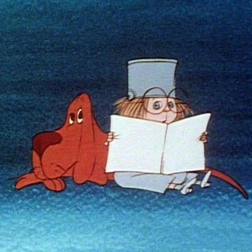 Tegning af dreng, der læser og hund